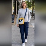 Re-sails Newport Sailboat Cloth Yellow, Navy, And White Bag Pre-owned. Price: $50.00.