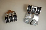 Used Harken Micro Triples Becket- Cammatic Cleat / Downhaul Or Backstay Adj.. Price: $70.00.